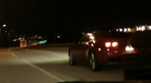 Picture time. It's 1 a.m. so we don't want to flash right into the guys window. But we're slightly crazy.