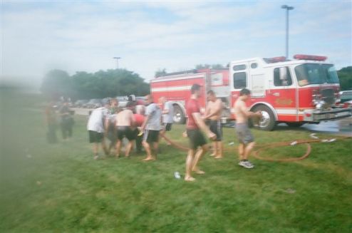 Firefighters. Big Hoses. Water. Yes, please.