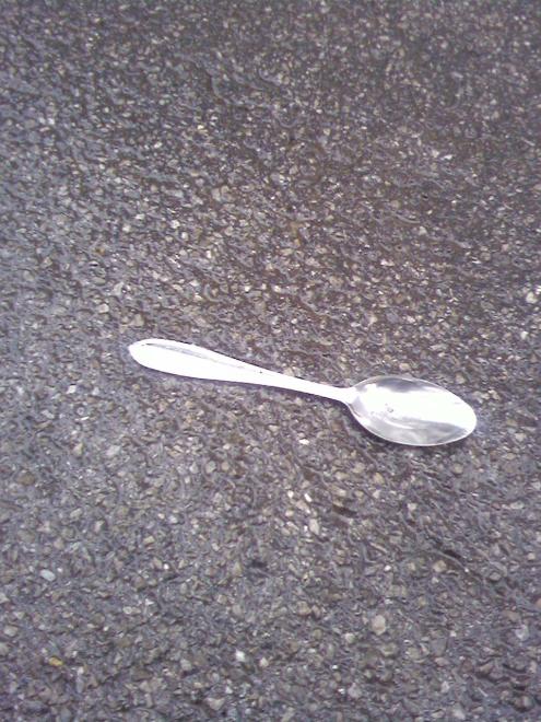 Spoon. Just laying in the street. I know. It's weird.